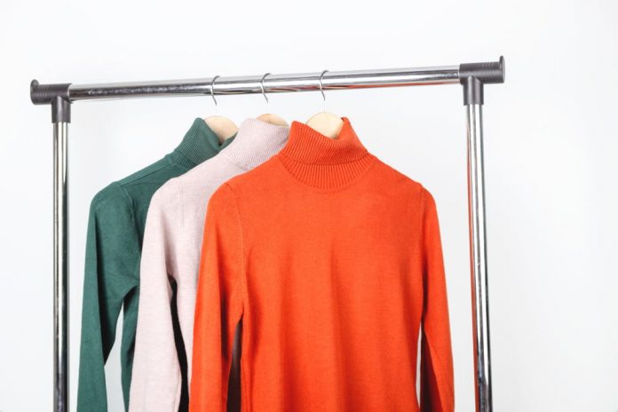 blank turtleneck sweater mockup clothes hanger bright orange ocher rollneck with beige green